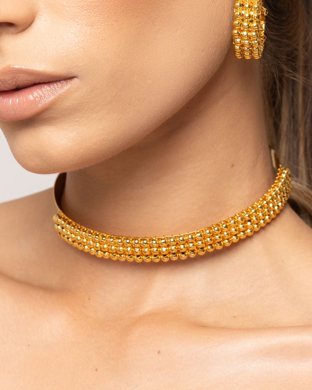 Choker bolitas alrededor
