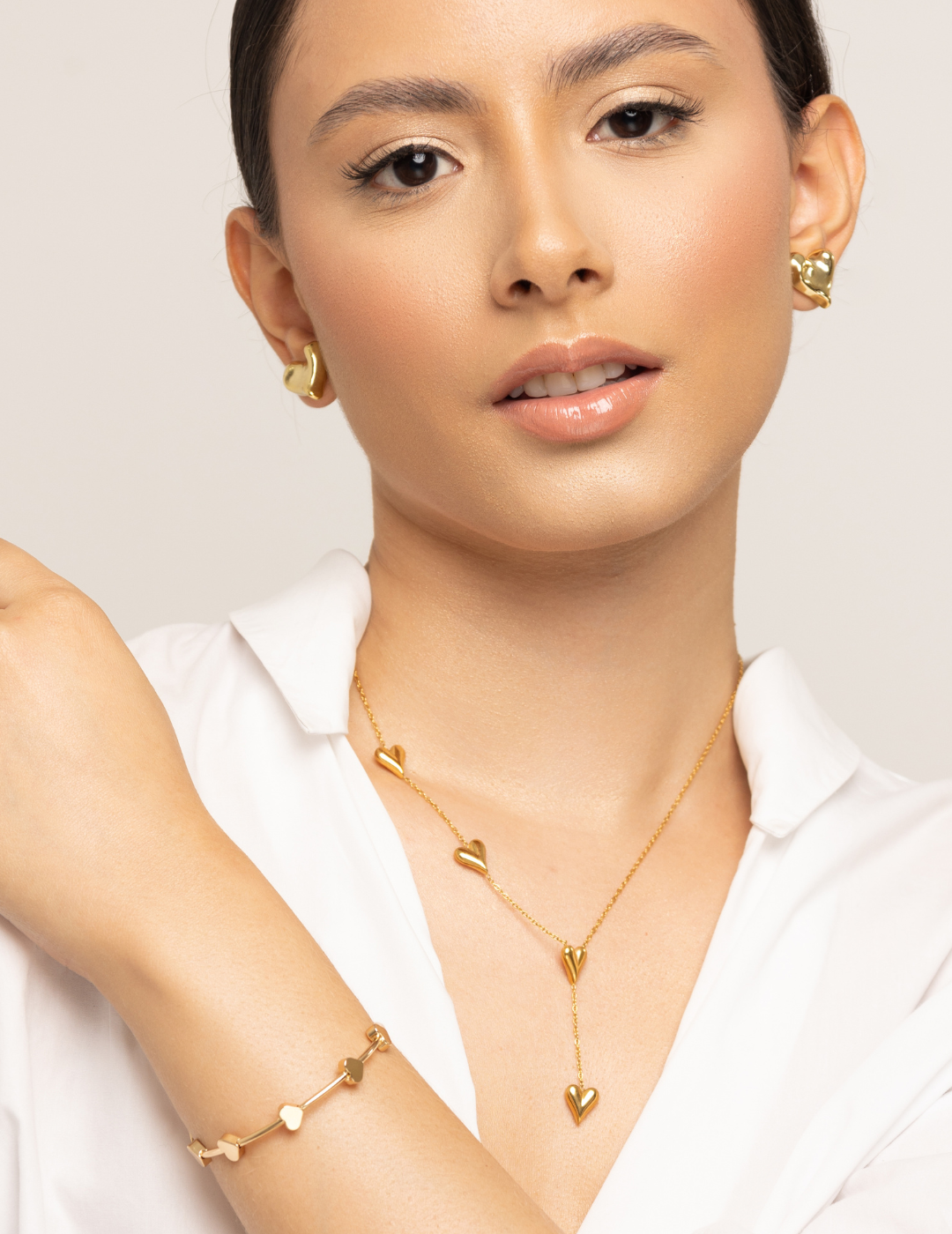 Set cadena corazón + aretes + brazalete